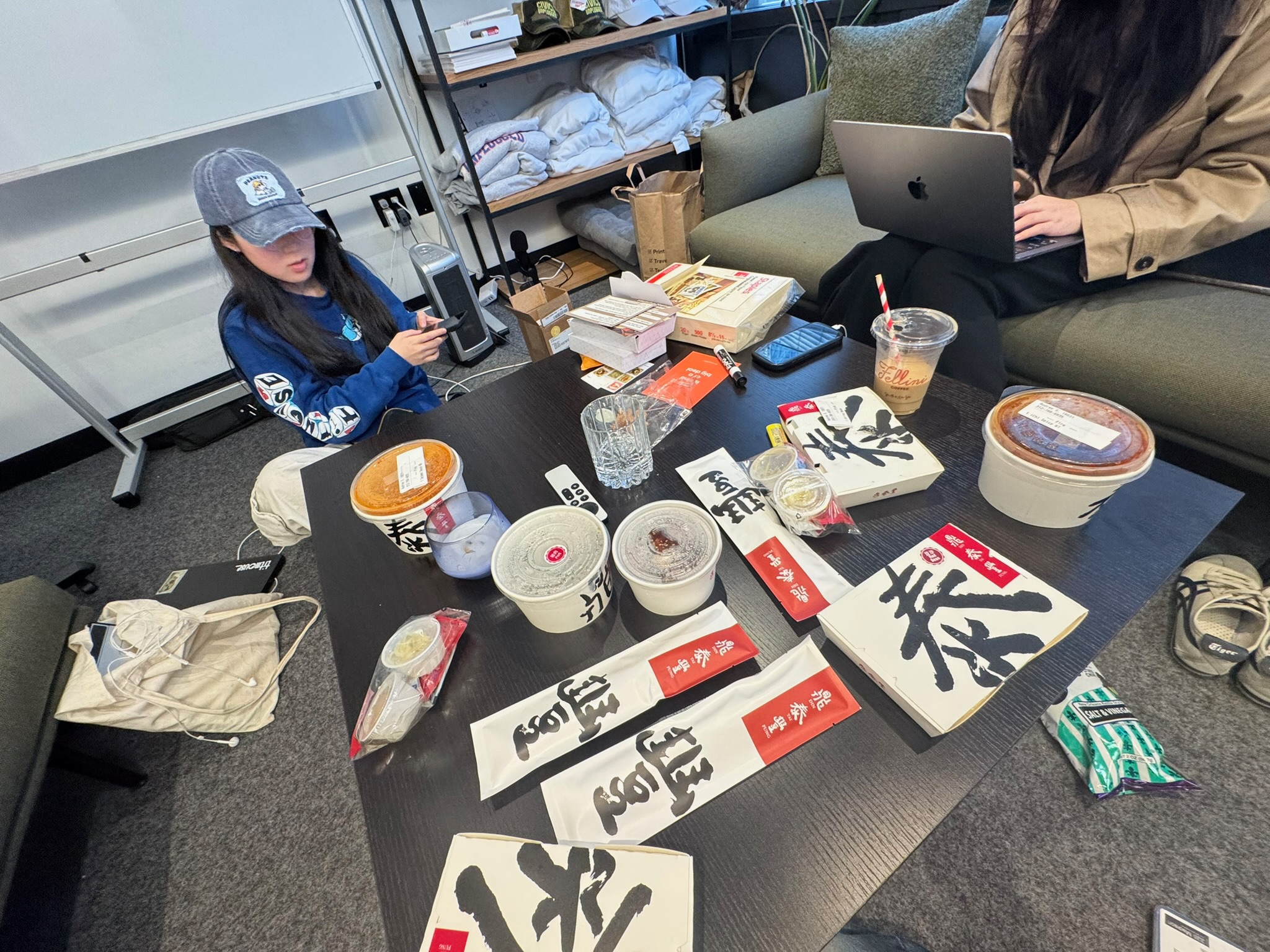 Team study and work session with laptops and food