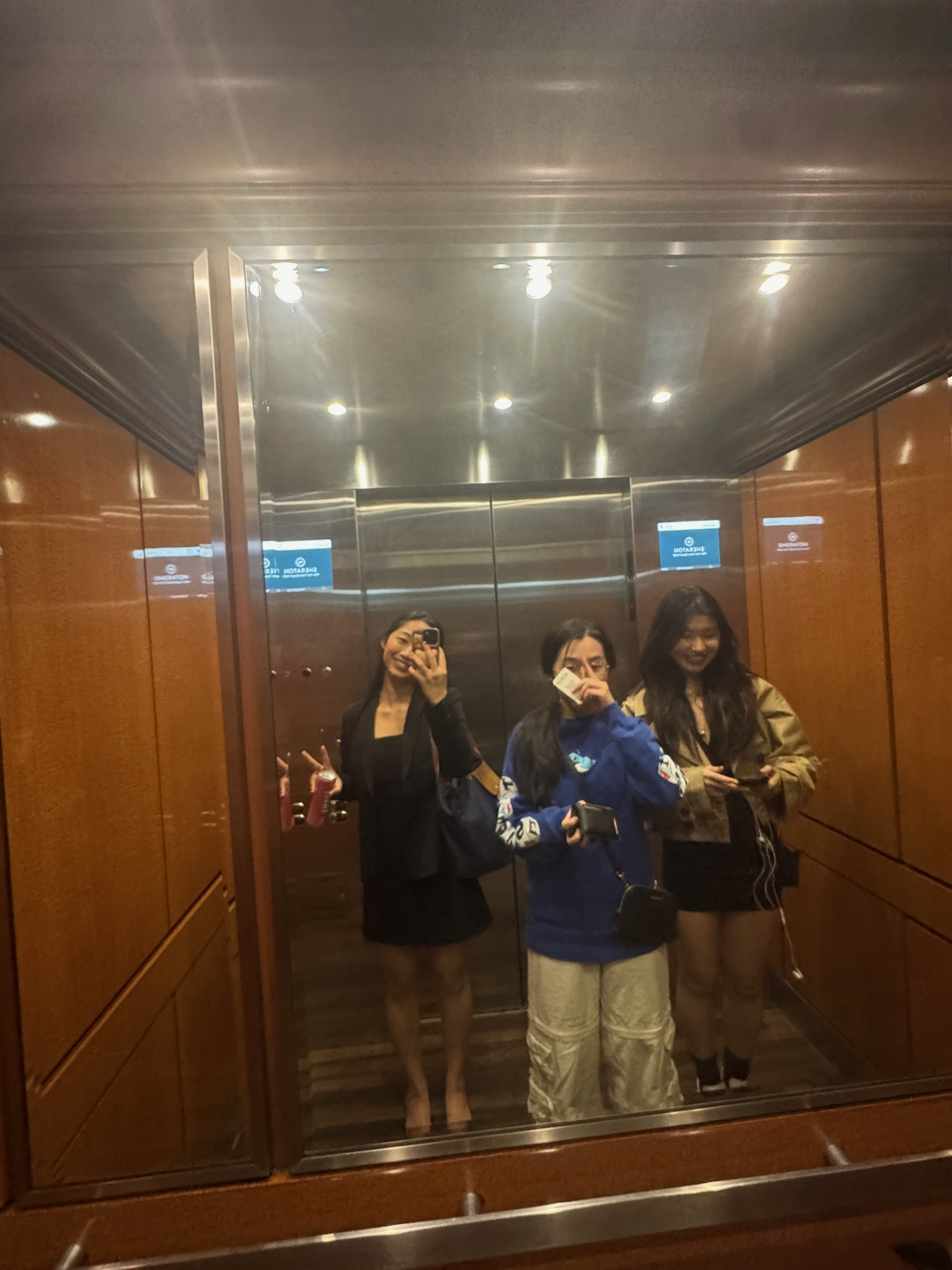 Founding team mirror selfie during a work trip